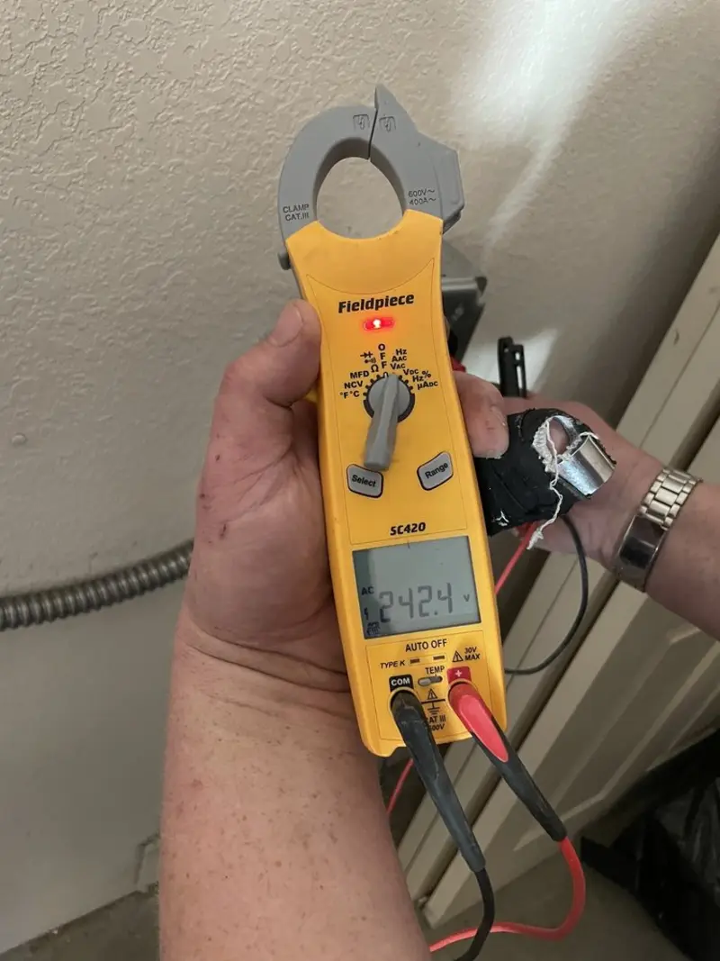 Voltage testing with clamp meter during Aluminum Wiring Replacement in Kalispell